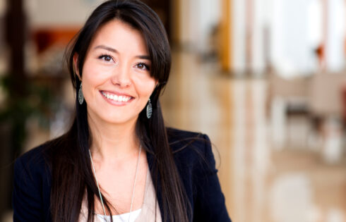 Casual woman looking happy and smiling